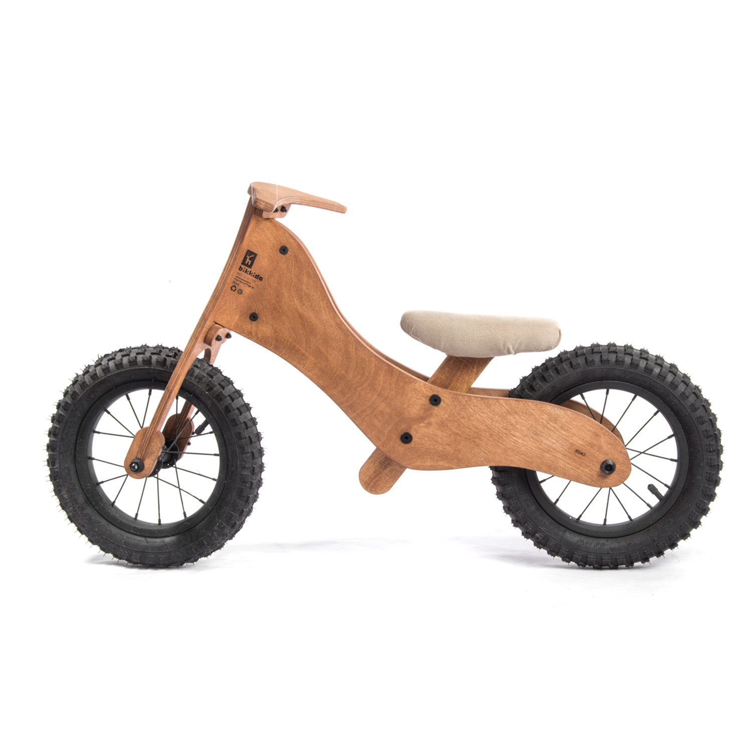 A handmade wooden balance bicycle